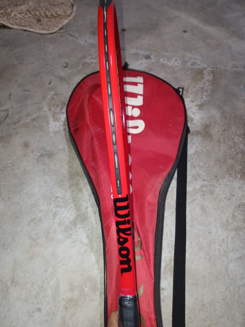 WILSON Tennis Racket (Category: Other Sports Equipment and Supplies) located in Lubao. Submitted by evaagayllee (Listing ID 1465630514, Image 2). Description: has 2 balls madumi na ’yung bag, but kapag brinush, magiging bago looks naman. may "S. D. A.” lang na nakasulat..