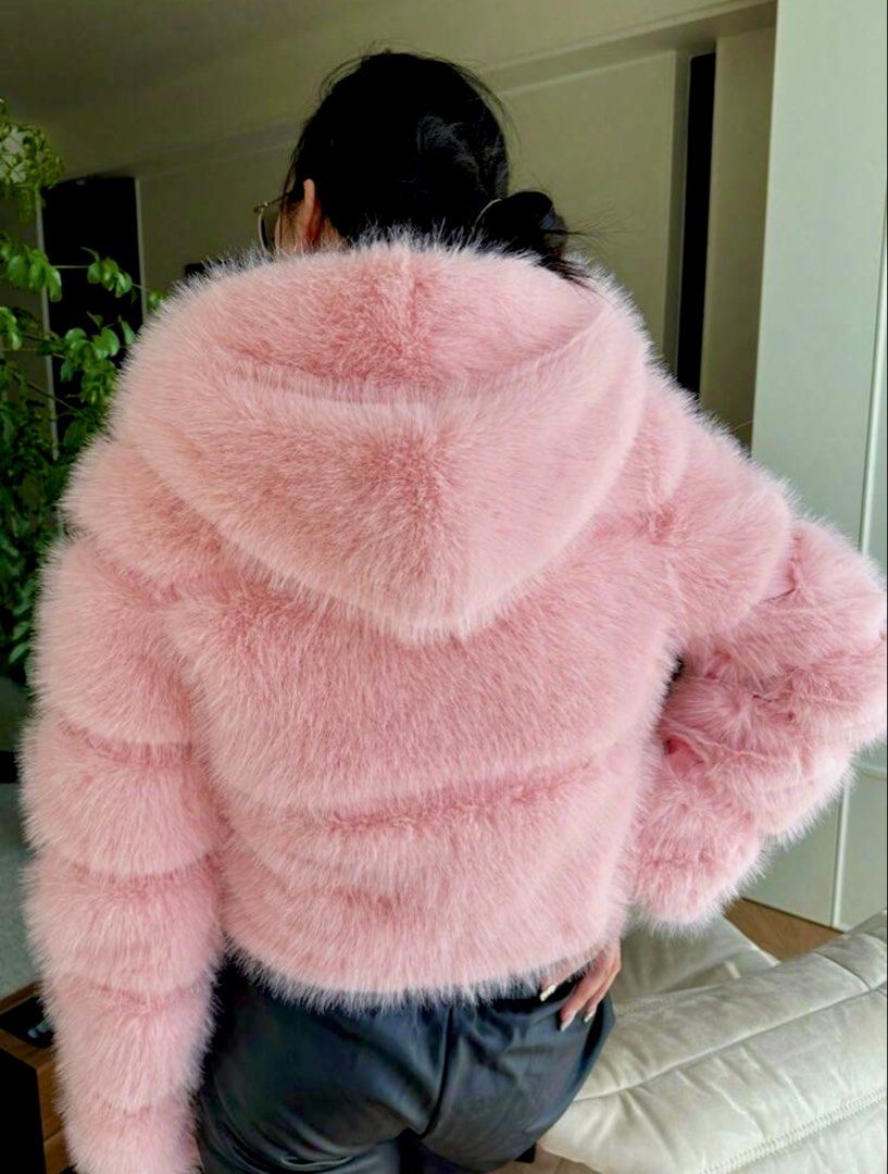 Winter jacket with hood for women (Category: Coats, Jackets and Outerwear) located in Quezon City. Submitted by shop.fashionizta (Listing ID 1465619126, Image 2). Description: ✅ON HAND✅ Small-Medium (2 stocks only) Blush Pink Faux Fur Hooded Jacket A cute and stylish blush pink faux fur jacket designed to keep you cozy while adding a soft, feminine touch to your winter look. It features a fluffy oversized hood, plush long-pile fur, long sleeves, 