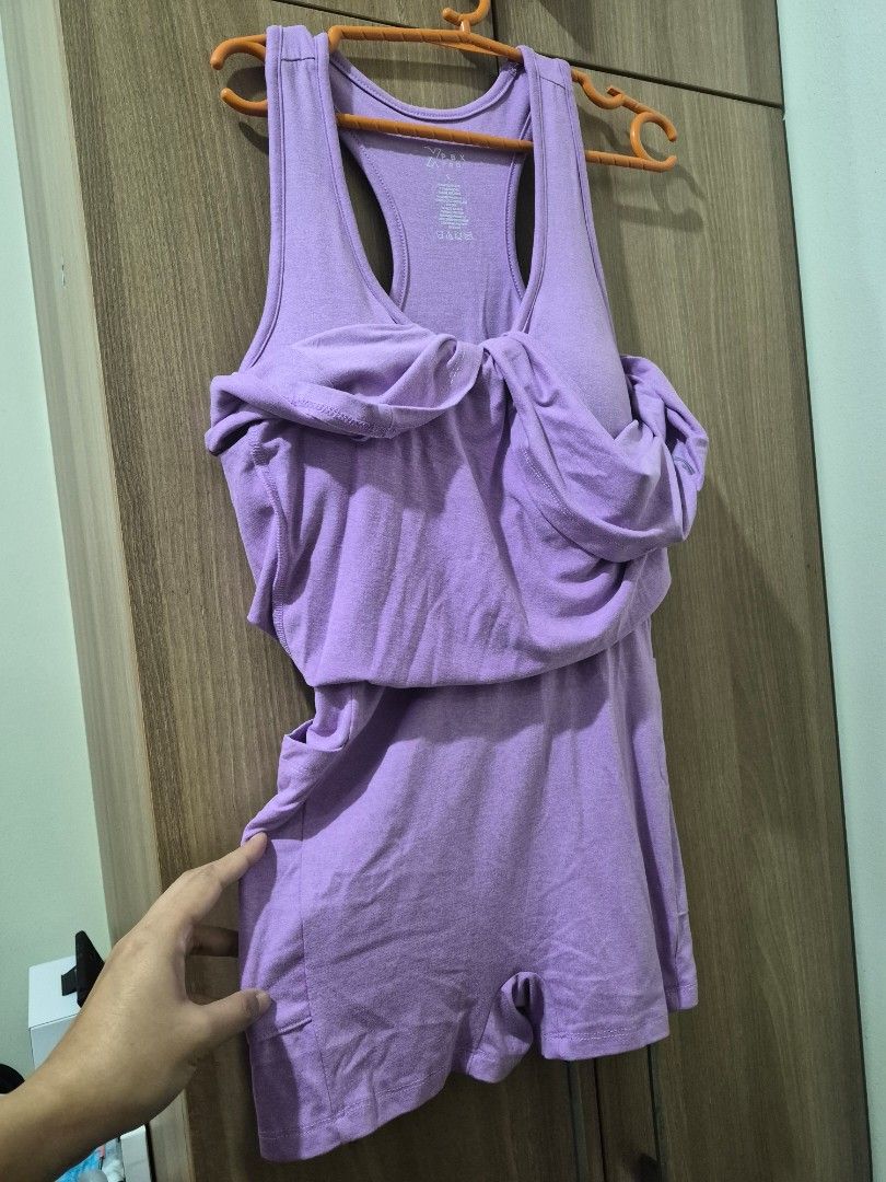 XPBX Pro Purple Activewear Romper Size S (Category: Activewear) located in Mandaluyong City. Submitted by cldnmoris (Listing ID 1465720427, Image 3). Description: - Brand: XPBX Pro - Item: Athletic dress with built-in shorts - Color: Purple - Size: Small - Material: 89% Polyester, 11% Spandex - Features: Built-in bra pads for extra support, racerback design - Condition: Great piece for workouts or running errands.