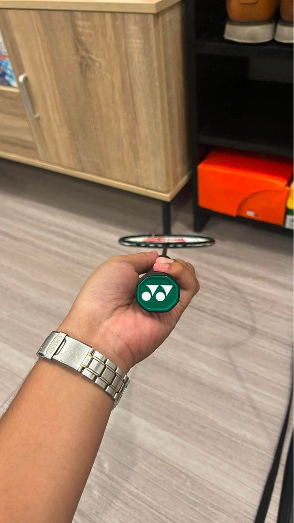 Yonex Astrox Nextage Badminton Racket with Cover (Category: Racket and Ball Sports) located in Manila. Submitted by lhynthea (Listing ID 1465695233, Image 3). Description: - Model: Yonex Astrox Nextage Badminton Racket - Color: Black and green - Inclusions: Matching Yonex Astrox carrying bag with strap - Grip: Standard grip size with Yonex logo butt cap - Condition: Strung and ready for play - Ideal for: Great setup for regular court sessions.