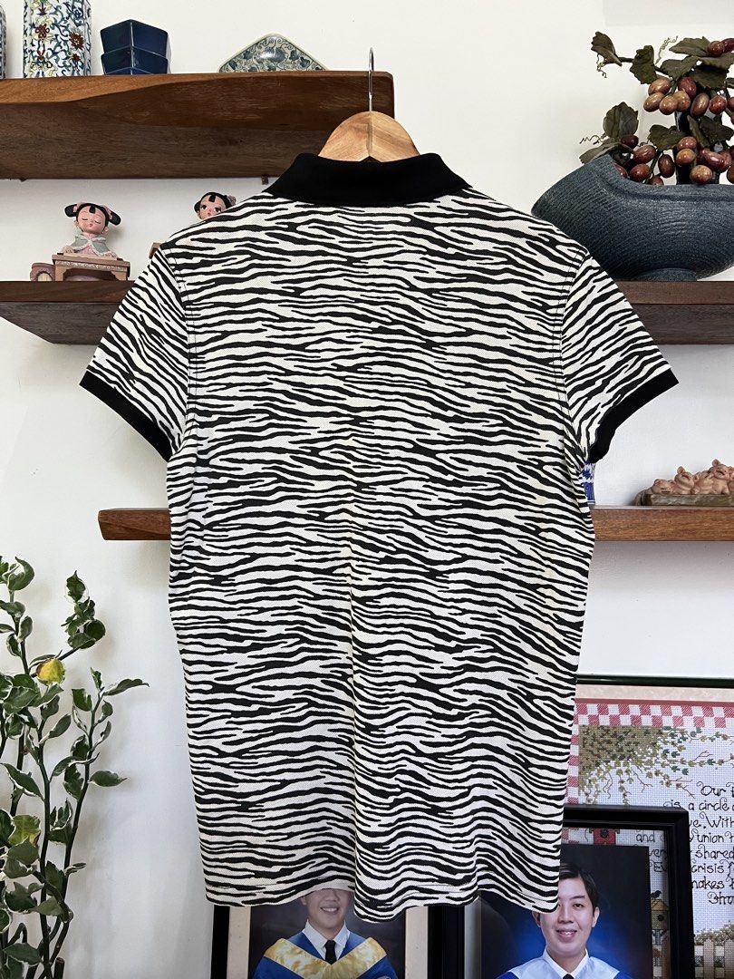 YSL ZEBRA PRINT POLO SHIRT (Category: Luxury Apparel) located in Solano. Submitted by aljoners (Listing ID 1465621073, Image 2). Description: Size: M Width: 19.5 Length: 27 Color rate: 10/10 Condition: 10/10 Issue/s: None “Color may vary due to lighting”.