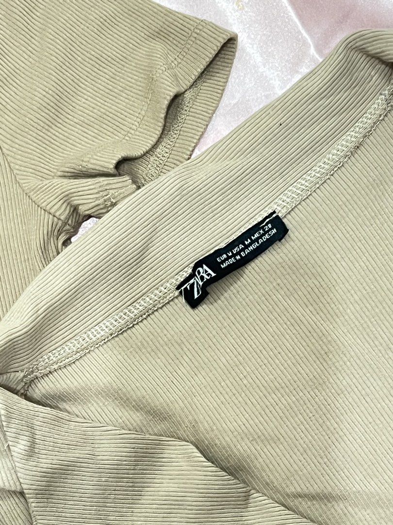 Zara and Forever 21 Tops (S-M) Bundle (Category: Sleeveless) located in Cabuyao City. Submitted by matchaa.lattee (Listing ID 1465629749, Image 2). Description: - 2-piece neutral beige ribbed top set - Piece 1: Zara collared button-down crop top, Size M - Piece 2: Forever 21 short sleeve bodysuit, Size S - Selling together as a set po Preloved items po ito, expect po na signs of usage, but still in good condition. (May stain but washable) Pm for 