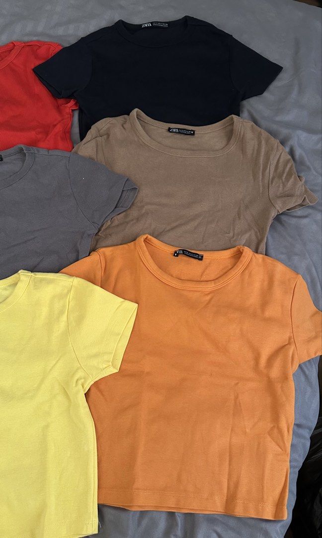 Zara Basic Fit Crop Tops (Category: Others Tops) located in Taguig. Submitted by cilegna (Listing ID 1465602642, Image 3). Description: Take All — ₱600 Individual — ₱120 each 💛 Yellow & Orange — Never worn 🩷 Other colors — Worn only 1–3 times ✨ All good as new! Size: Small.
