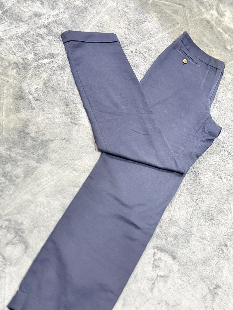 Zara Basic Navy Blue Cuffed Trousers Size USA 08 (Category: Jeans) located in Manila. Submitted by yeti_it (Listing ID 1465710610, Image 3). Description: - Brand: Zara Basic - Color: Navy Blue - Size: EU 40 / US 8 / Mex 30 - Style: Tailored cut with cuffed ankles - Details: Chic button accent on the front pocket - Origin: Made in Indonesia - Condition: Clean and ready to wear for work or casual outings.