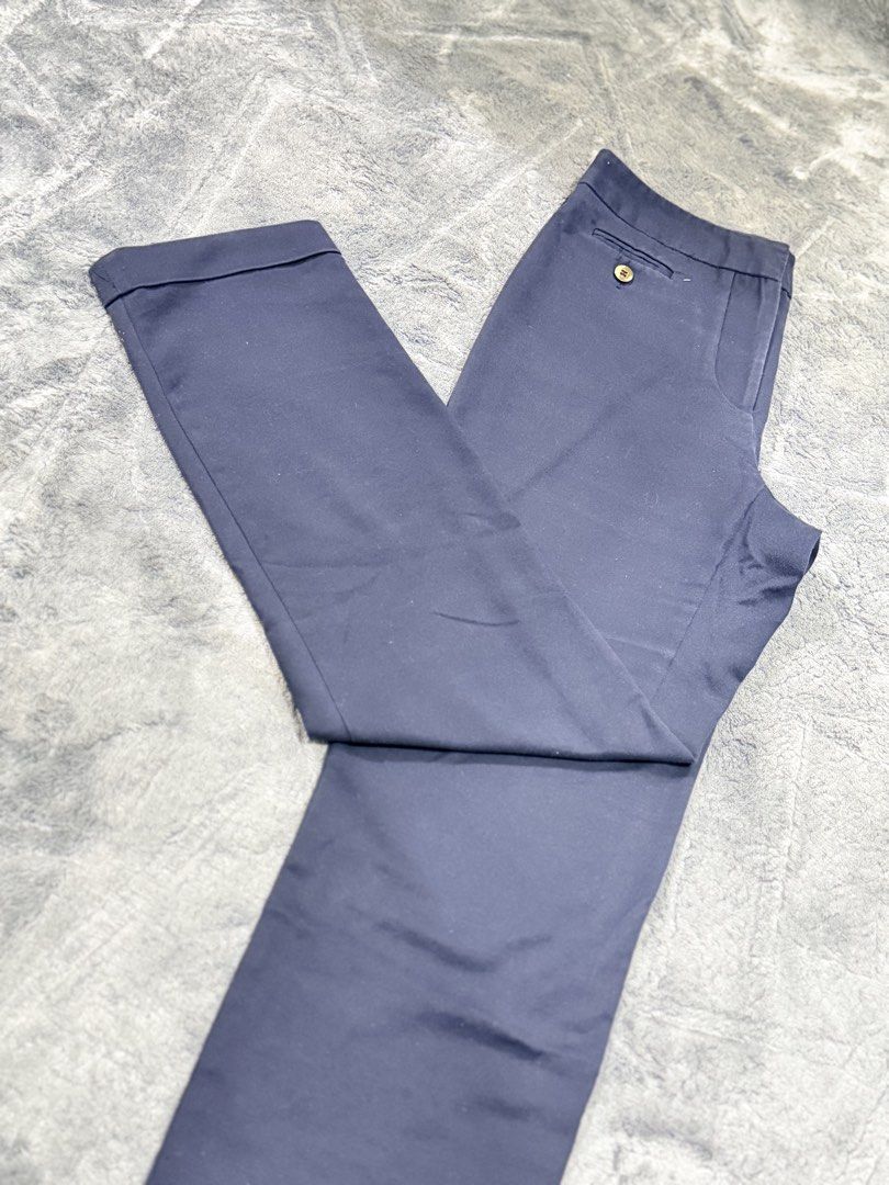 Zara Basic Navy Blue Cuffed Trousers Size USA 08 (Category: Jeans) located in Manila. Submitted by yeti_it (Listing ID 1465710610, Image 2). Description: - Brand: Zara Basic - Color: Navy Blue - Size: EU 40 / US 8 / Mex 30 - Style: Tailored cut with cuffed ankles - Details: Chic button accent on the front pocket - Origin: Made in Indonesia - Condition: Clean and ready to wear for work or casual outings.