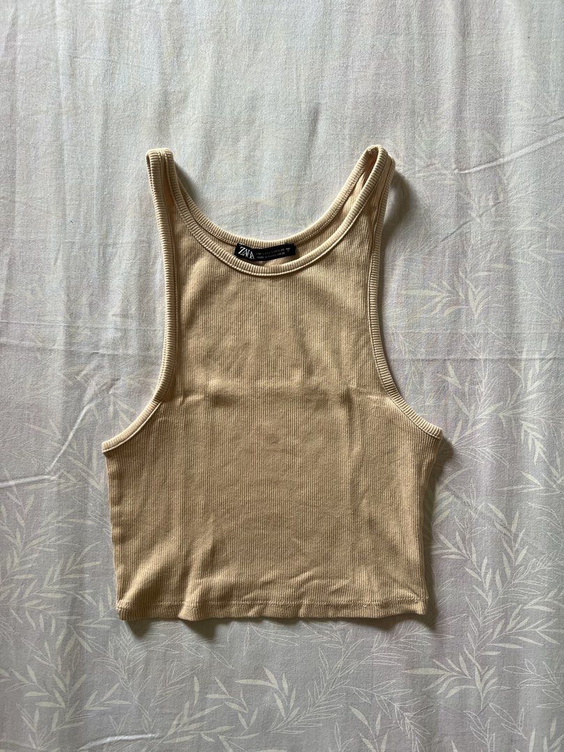 Zara Beige Ribbed Halter Tank Top (Category: Sleeveless) located in Quezon City. Submitted by katedeclutter (Listing ID 1465599271, Image 1). Description: - Brand: Zara - Size: S .
