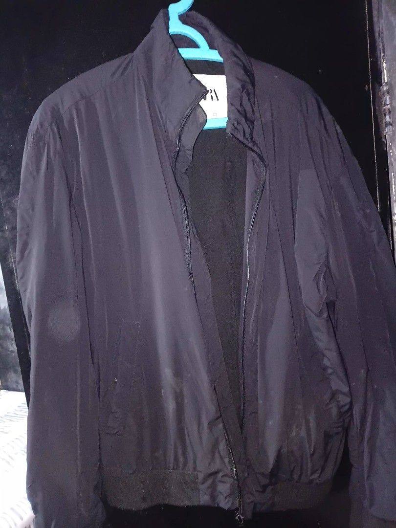 Zara Black Bomber Jacket (Category: Coats, Jackets and Outerwear) located in Manila. Submitted by keenphoenix_9ed053 (Listing ID 1465758455, Image 1). Description: - Brand: Zara - Color: Black - Style: Lightweight zip-up bomber jacket - Features: Front pockets, ribbed cuffs and hem - Condition: Clean and ready to wear.