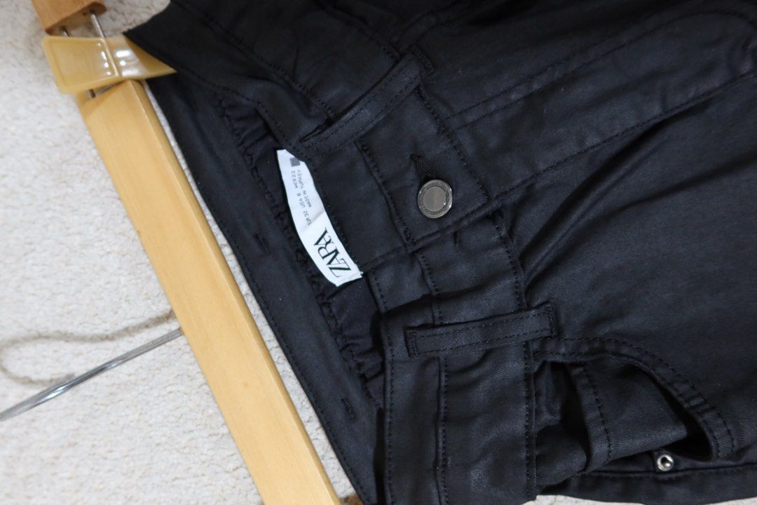 Zara Black Coated Pants EUR 32 (Category: Jeans) located in Cabanatuan. Submitted by jstne_ (Listing ID 1465611125, Image 2). Description: - Brand: Zara - Style: Black coated pants with paperbag waist and belt loops - Fit: Slim fit legs, front button closure - Size: EUR 32 / USA 0 / MEX 22 - Origin: Made in Turkey - Condition: Clean look, versatile piece that goes with everything.