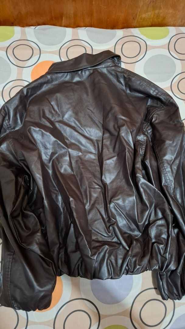 Zara Brown Faux Leather Jacket Size S (Category: Coats, Jackets and Outerwear) located in Paranaque City. Submitted by furotetsuu (Listing ID 1465671488, Image 2). Description: - Brand: Zara - Size: S - Material: Faux Leather - Color: Brown - Design: Classic collared with front zipper closure - Pockets: Two front pockets - Condition: Great outerwear piece for cooler days, needs ironing - Not sure if legit but great quality - Used once for Korea t