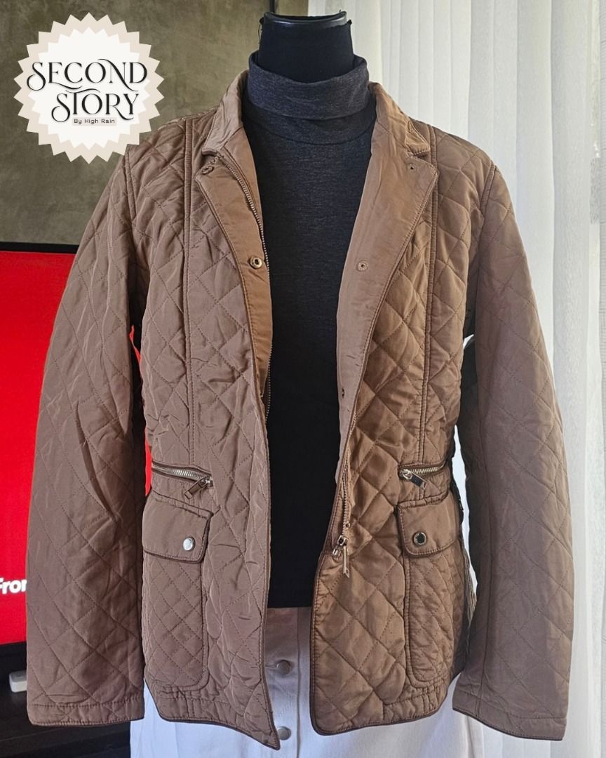 Zara Brown Quilted Jacket with Front Pockets (Category: Coats, Jackets and Outerwear) located in Cavite. Submitted by secondstorybyhighrain (Listing ID 1465598621, Image 1). Description: - Color: Brown - Pattern: Diamond quilting all over - Closure: Front button and zipper - Pockets: Two lower flap pockets with snap buttons and zippered accent pockets above - Sleeves: Long with button cuffs - Details: Collared neckline and tailored waist belt wit