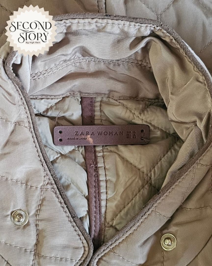 Zara Brown Quilted Jacket with Front Pockets (Category: Coats, Jackets and Outerwear) located in Cavite. Submitted by secondstorybyhighrain (Listing ID 1465598621, Image 3). Description: - Color: Brown - Pattern: Diamond quilting all over - Closure: Front button and zipper - Pockets: Two lower flap pockets with snap buttons and zippered accent pockets above - Sleeves: Long with button cuffs - Details: Collared neckline and tailored waist belt wit