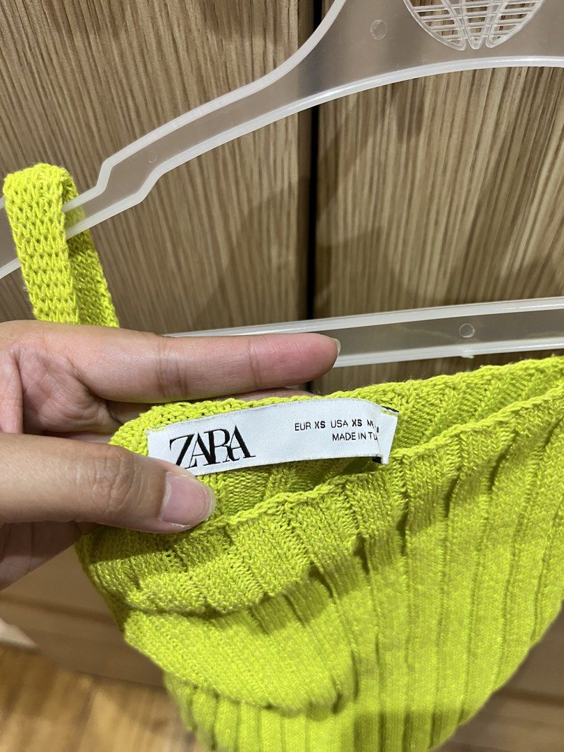 Zara Lime Green Ribbed Knit Tank Top (Category: Sleeveless) located in Mandaluyong City. Submitted by hyyzl (Listing ID 1465640422, Image 2). Description: Brand: Zara - 10/10 condition, like new - stretchable knitted cotton fabric - lime green in color with with ribbed design - can fit XS-S RFS: Decluttering Message for other price offers/questions..