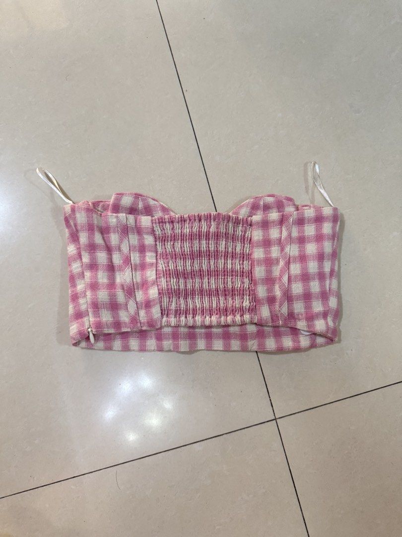 Zara Pink Gingham Plaid Bustier Crop Top (Category: Sleeveless) located in Quezon City. Submitted by sweetlyluxe (Listing ID 1465605534, Image 2). Description: - Brand: Zara - Size: S - Pattern: Pink and white gingham - Details: Sweetheart neckline with structured cups, stretchy smocked back panel, side zipper closure, and thin shoulder straps - Condition: Excellent, no flaws noticed - Vibe: Perfect for warm weather and casual outings - garden pa