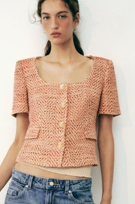 Zara Textured Tweed Crop Jacket Orange (Category: Coats, Jackets and Outerwear) located in Manila. Submitted by rcloset___ (Listing ID 1465632467, Image 2). Description: - Brand: Zara - Style: Textured tweed crop jacket with short sleeves and scoop neckline - Color: Vibrant orange with multicolor woven threads (hints of pink and purple) - Details: Gold-toned embossed front buttons, two front flap pockets, fully lined in white fabric - Condition: 