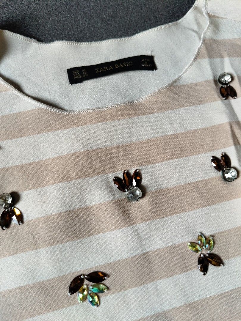 Zara Top with rhinestones (Category: Blouses) located in Cebu City. Submitted by paulactan (Listing ID 1465636453, Image 2). Description: size M on tag (can fit upto large) womens beige ivory Striped rhinestone tank top.