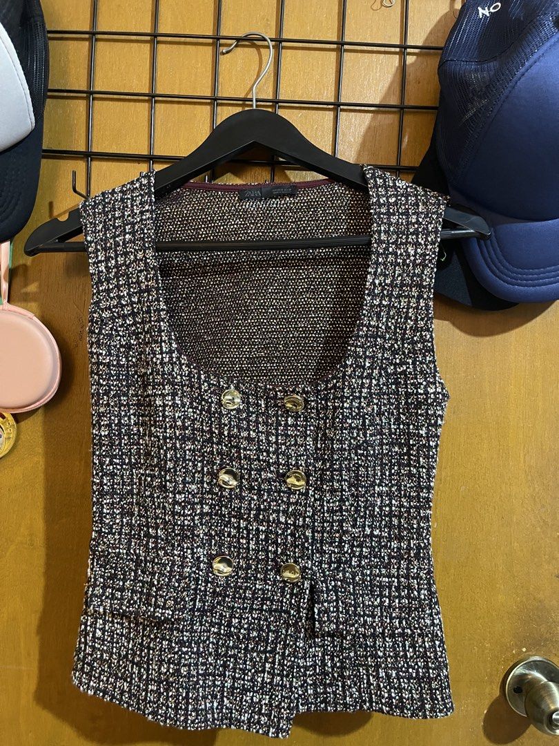 Zara Tweed Vest Double-Breasted Size S (Category: Sleeveless) located in Pasay City. Submitted by etcunlimited0 (Listing ID 1465687162, Image 1). Description: - Brand: Zara - Style: Double-breasted tweed vest with scoop neckline - Color/Design: Black with multicolored threads and elegant gold buttons - Fabric: Structured knit with a subtle metallic finish - Size: S - Origin: Made in Morocco - Condition: Clean interior lining, tags and labels inta