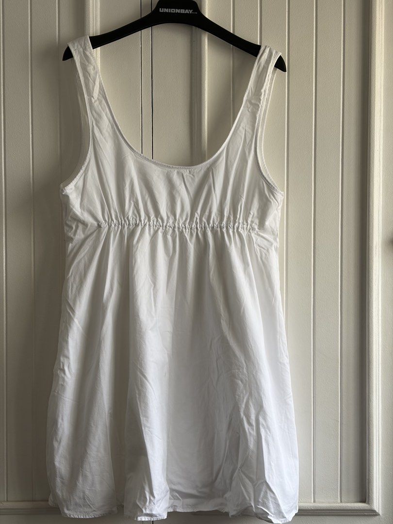 Zara White Bubble Hem Dress Size L (Category: Dresses) located in Bacolod City. Submitted by francine_favss (Listing ID 1465596140, Image 2). Description: - Brand: Zara - Style: Sleeveless scoop neck dress with ruched bust and bubble skirt hem - Color: White - Size: EUR L / USA L / MEX 30 - Material: Lightweight fabric - Origin: Made in Morocco - Condition: Clean and ready to wear.