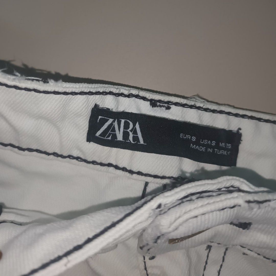 Zara White Denim Mini Skirt (Category: Skirts) located in Magdalena. Submitted by lianpacle (Listing ID 1465694987, Image 3). Description: - well used but still in good condition - some parts has yellowish stains - best fits 27-29 mop: gcash, gotyme mod: j&t.