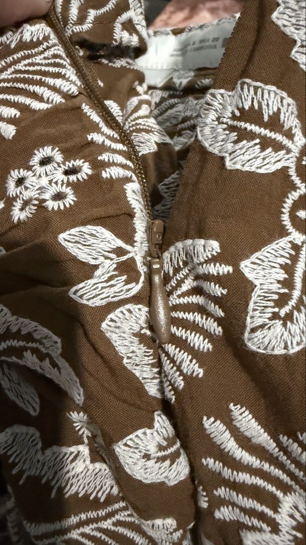 Zara Women’s Wrap Shorts (Category: Shorts) located in Makati City. Submitted by clutterfreejia (Listing ID 1465754836, Image 3). Description: Store bought at Zara Glorietta Style: Wrap-style brown shorts with white floral embroidery and side tie detail Size: S / EUR S / MEX 26 Closure: Hidden side zipper Origin: Made in Cambodia Rfs: too many shorts, decluttering.