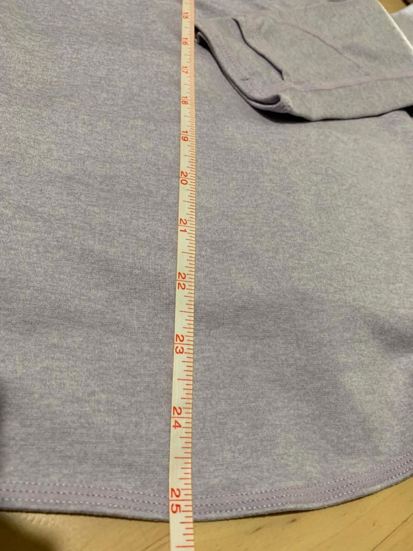 Zella Lavender Heathered Pullover Hoodie Sweatshirt Size Small (Category: Coats, Jackets and Outerwear) located in Manila. Submitted by musedeclutters (Listing ID 1465643386, Image 2). Description: - Brand: Zella - Size: Small (S) - Color: Soft lavender heather - Material/Interior: Cozy fleece texture - Design: Crossover collar, adjustable drawstring hood, long sleeves - Features: Front kangaroo pocket, curved hem, small metallic logo charm - Con