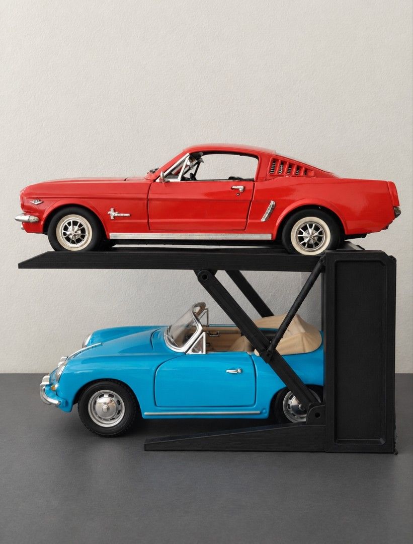 1/18 diecast car lift model stand (Category: Vehicle & Diecast Models) located in Pasig City. Submitted by bigfishyyy (Listing ID 1471132738, Image 2). Description: - Custom double-decker parking lift for diecast cars - Sleek grey or black finish with support pillars - Perfect for showcasing your scale model collections Location: Pasig Available for pick up.