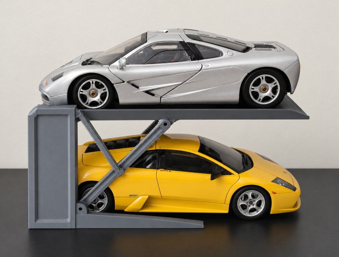 1/18 diecast car lift model stand (Category: Vehicle & Diecast Models) located in Pasig City. Submitted by bigfishyyy (Listing ID 1471132738, Image 3). Description: - Custom double-decker parking lift for diecast cars - Sleek grey or black finish with support pillars - Perfect for showcasing your scale model collections Location: Pasig Available for pick up.