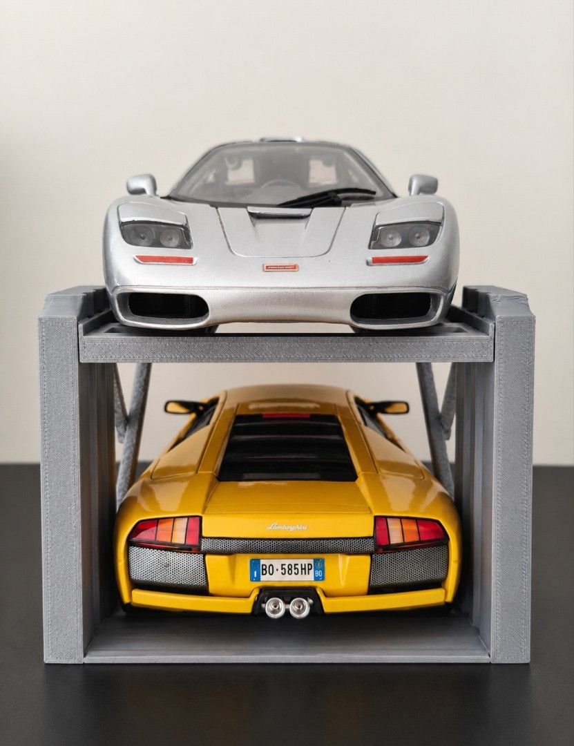 1/18 diecast car lift model stand (Category: Vehicle & Diecast Models) located in Pasig City. Submitted by bigfishyyy (Listing ID 1471132738, Image 1). Description: - Custom double-decker parking lift for diecast cars - Sleek grey or black finish with support pillars - Perfect for showcasing your scale model collections Location: Pasig Available for pick up.
