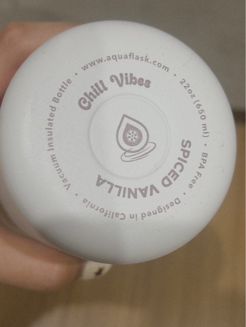 22 Oz. Vanilla Spiced AquaFlask Water Bottle (Category: Water Bottles & Tumblers) located in Manila. Submitted by extras_bym (Listing ID 1471244344, Image 3). Description: - Brand: AquaFlask - Color: White with soft pink lid and matching silicone boot - Condition: Good, with a minor scuff spot on the spout cover - Features: Double-wall insulation keeps drinks cold all day - Best for: School, gym, office, or daily use - PM for fast shipping and in
