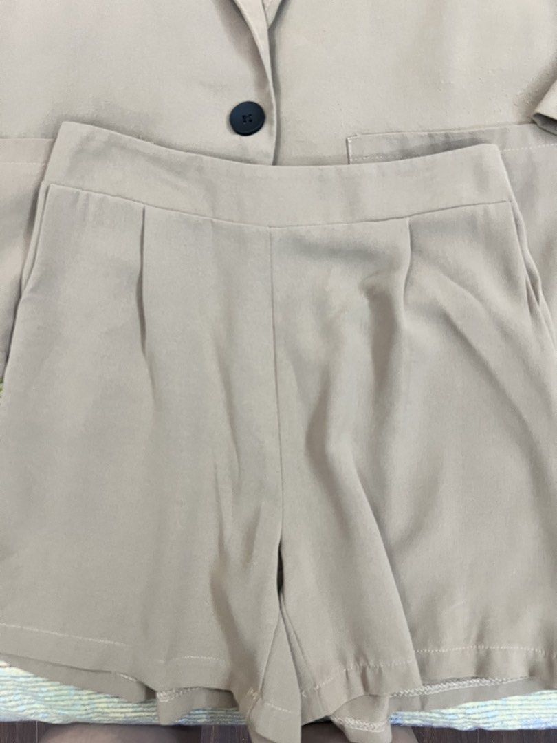 2-Piece Blazer & Pleated Shorts Co-ord Set (Category: Coats, Jackets and Outerwear) located in Mandaluyong City. Submitted by one.stopshop (Listing ID 1471240086, Image 3). Description: Condition: Used - Well used / Lightly used (Honest condition rating: 7.5 to 8/10) Description: Type: 2-Piece Matching Blazer & Shorts Coordinates Size: Best fits Small to Semi-Medium (Free Size / roughly 25–28” waist) Color: Taupe / Khaki / Muted Beige Details: To