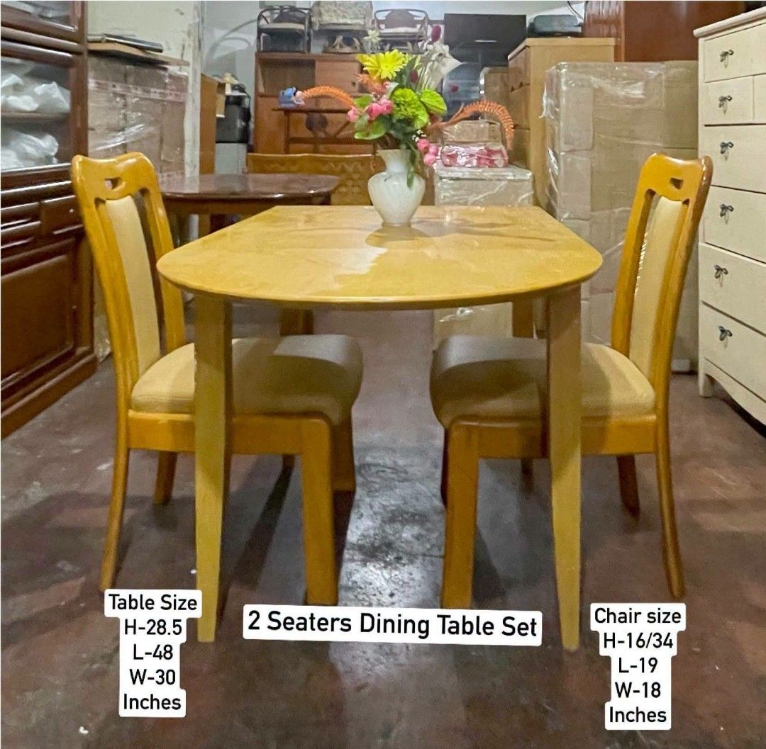 2-Seater Extendable Dining Table and Chairs Set (Category: Tables & Sets) located in Quezon City. Submitted by dannikkishoppe2 (Listing ID 1471177302, Image 2). Description: 2-Seater Extendable Dining Table and Chairs Set‼️₱8000‼️ Elegant and space-saving dining table set with 2 comfortable chairs. Perfect for small dining spaces! Please manage your expectations as there might be minimal flaws. Color may vary due to lighting, it may appear darker