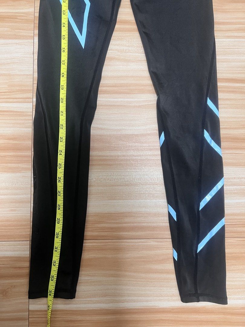 2XU Womens Compression Leggings Black Blue Size L (Category: Activewear) located in Manila. Submitted by jk2578 (Listing ID 1471136514, Image 2). Description: - Brand: 2XU - Item: Women's compression leggings - Color: Black with blue signature X branding - Size: L (Waist: ~13 inches across, Length: ~34 inches down the side) - Features: Inner drawstring closure for a secure fit - Origin: Made in Thailand - Condition: Excellent quality, perfect for