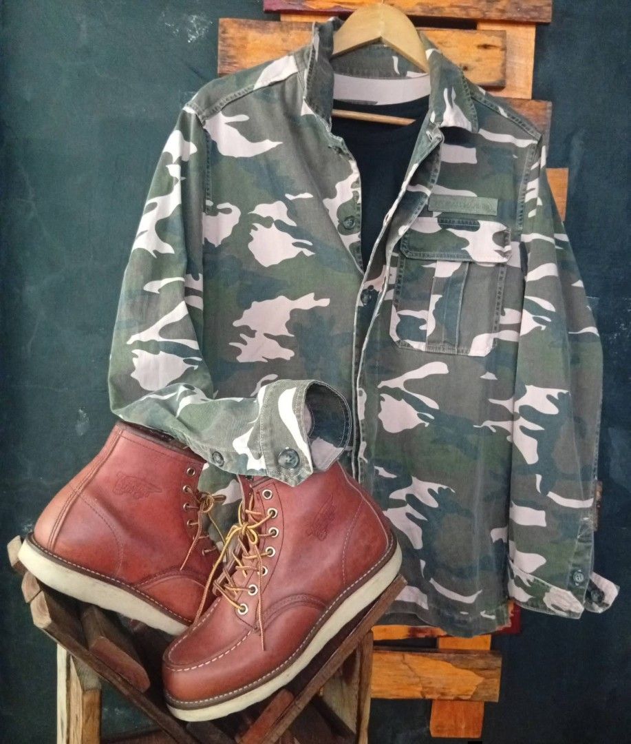 7 For All Mankind Camouflage Jacket (Category: Coats, Jackets and Outerwear) located in Manila. Submitted by fastdragon_62f8c6 (Listing ID 1471245747, Image 3). Description: - Brand: 7 For All Mankind - Style: Camouflage button-up utility jacket - Colorway: Pink, green, and dark grey print - Details: Chest pocket with embroidered brand patch, collared neckline, button cuffs - Origin: Made in Italy - Condition: Excellent, great layering piece.