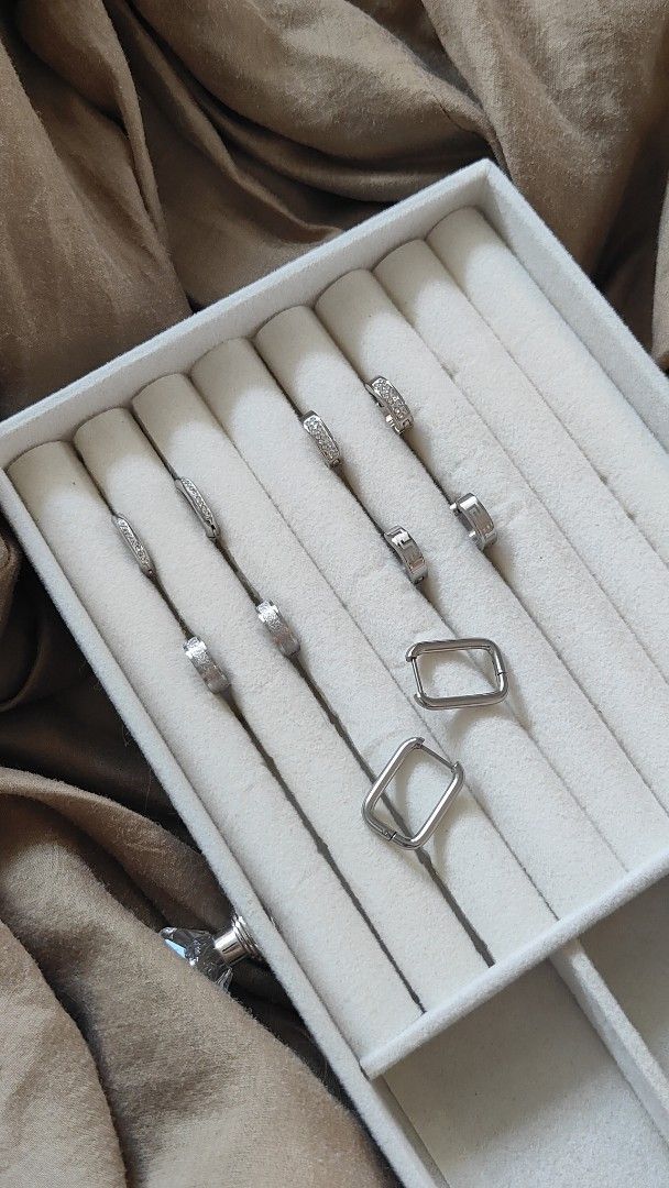 (80 each pair )Silver Hoop Earrings Various Designs (Category: Earrings) located in Quezon City. Submitted by thestargazerspica (Listing ID 1471207891, Image 2). Description: -80 pesos each - Non Tarnish rhinestone-encrusted, geometric, and rectangular designs - Features secure clasp closures on all pieces.