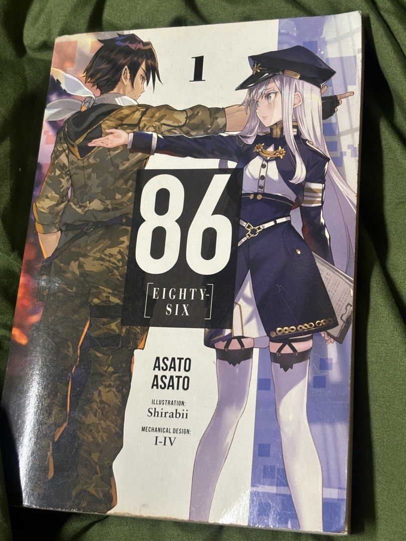 86 Eighty-Six Vol. 1 Light Novel Yen Press (Category: Comics & Manga) located in Los Banos. Submitted by somerandomthings (Listing ID 1471262930, Image 1). Description: - Title: 86 Eighty-Six Light Novel (Volume 1) - Publisher: Yen Press (English Edition) - Illustrator: Shirabii - Condition: Good, pre-loved - Flaws: Minor page yellowing from shelf storage; light scuff mark on the back cover - Interior: Clean, complete, and no missing pages.