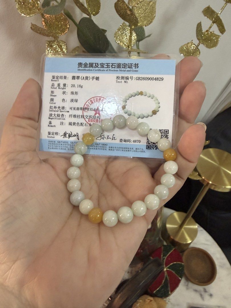 8mm Jadeite Jade Bracelet with Certificate (Category: Bracelets) located in Las Pinas. Submitted by fayeabell (Listing ID 1471156722, Image 2). Description: Natural jadeite bracelet featuring 8mm beads in light green with contrasting yellow-orange accent beads. Total weight is 20.18g. Includes authenticity certificate with test number GB2609004829. Smooth polished finish with comfortable stretch cord. Great piece for daily wear or gifting..