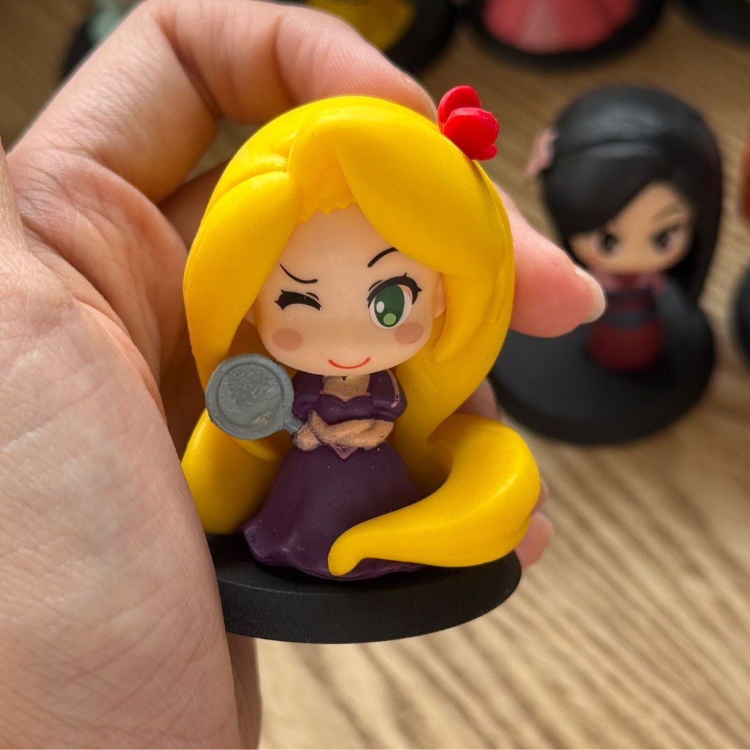 8pcs SET Disney Princess Chibi Mini Figures Collectible Set (Category: Designer & Blind Box Toys) located in Marikina City. Submitted by lovegoeson (Listing ID 1471198067, Image 2). Description: - set of 8 Disney Princess chibi figurines - Includes: Cinderella, Belle, Aurora, Snow White, Rapunzel (with frying pan), Jasmine, Mulan, and Merida (with bow & arrow) - Comes with individual black round bases for secure display - Highly detailed sculpts 