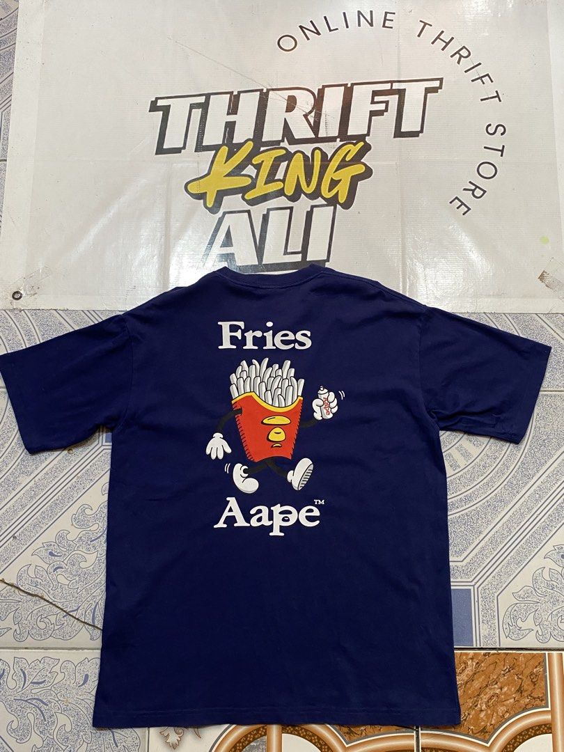 AAPE Fries Authentic Graphic Tee (Category: Activewear) located in Rosario. Submitted by thrift_king_ali (Listing ID 1471221779, Image 1). Description: AAPE Large Dimes: W-22 L-28 no issue excellent condition 9.9/10 600+sf.