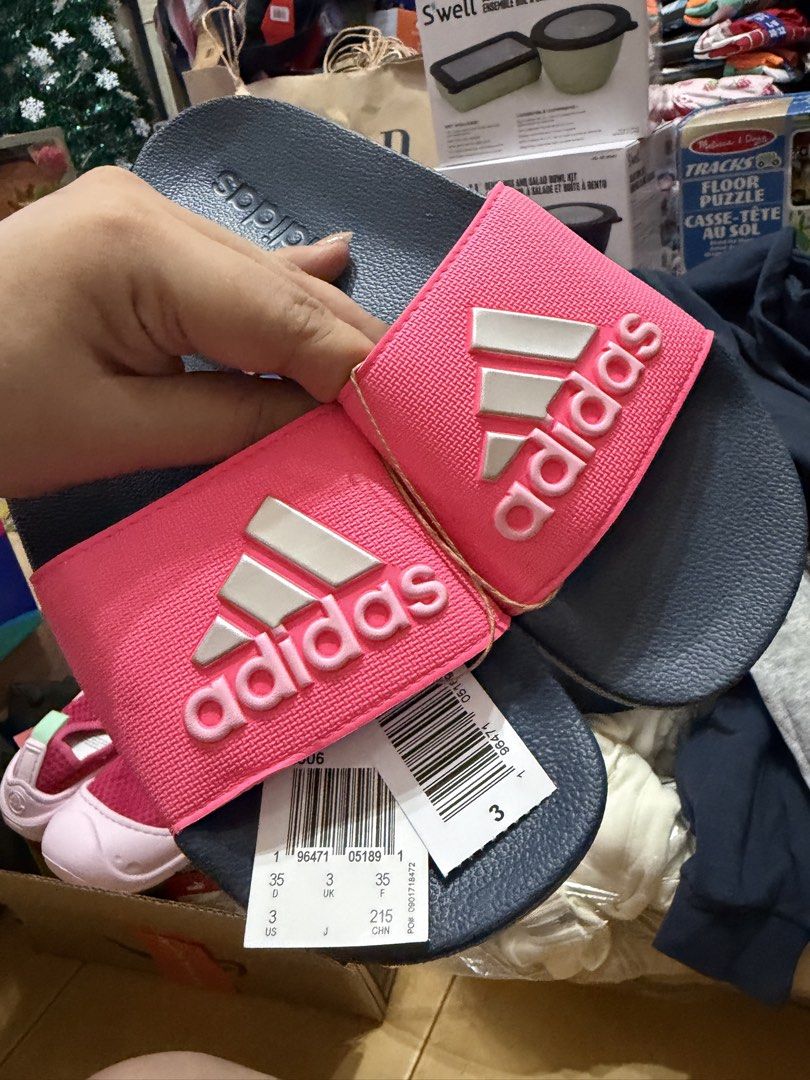 Adidas Adilette Shower K Slides (Category: Slippers and slides) located in Cavite. Submitted by xoxomhai (Listing ID 1471158375, Image 1). Description: Adidas Adilette Shower K Slides The perfect everyday slides for kids—lightweight, comfortable, and easy to wear for school, travel, beach trips, or everyday adventures! ❤️ Available Colors: 🔴 Red 🔵 Blue 📏 Available Sizes: Kids US 1–6 ✅ Soft synthetic upper for a comfortable fit ✅ Quick-drying d