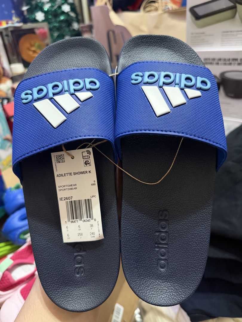 Adidas Adilette Shower K Slides (Category: Slippers and slides) located in Cavite. Submitted by xoxomhai (Listing ID 1471268704, Image 1). Description: Adidas Adilette Shower K Slides The perfect everyday slides for kids—lightweight, comfortable, and easy to wear for school, travel, beach trips, or everyday adventures! ❤️ Available Colors: 🔵 Blue 📏 Available Sizes: Kids US 1–6 ✅ Soft synthetic upper for a comfortable fit ✅ Quick-drying design –