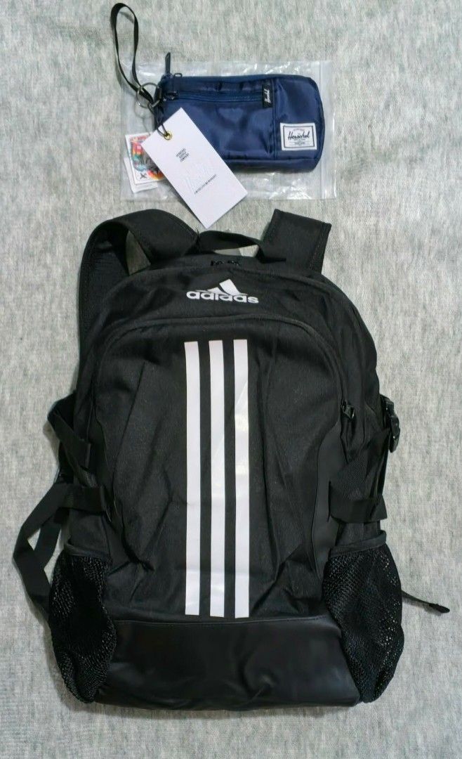 Adidas Backpack and Herschel Gadget/CP Pouch Set (Category: Backpacks) located in Quezon City. Submitted by thirdeedimesiv (Listing ID 1471225654, Image 2). Description: -Pamigay Sale!!! - Adidas black power 5 backpack with white stripes, mesh side pockets, and adjustable straps, fits upto 14" laptop. -has dedicated laptop compartment - Includes multiple brand-new Herschel pouches with original tags attached - Pouch colors and designs include nav