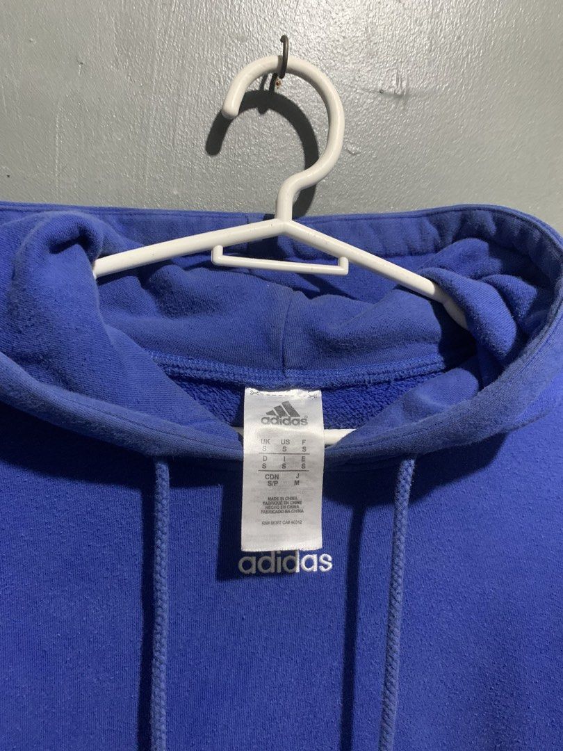 Adidas Blue Hoodie (Category: Coats, Jackets and Outerwear) located in Tarlac. Submitted by durkk4ever (Listing ID 1471258258, Image 2). Description: - Brand/Style: Adidas hoodie in a vibrant bright blue with a classic relaxed fit - Details: Front kangaroo pocket, adjustable drawstring hood, and small embroidered white logo below the neckline - Condition/Quality: Super comfortable for chilly days with solid ribbed cuffs and hem - Origin & Sizing: