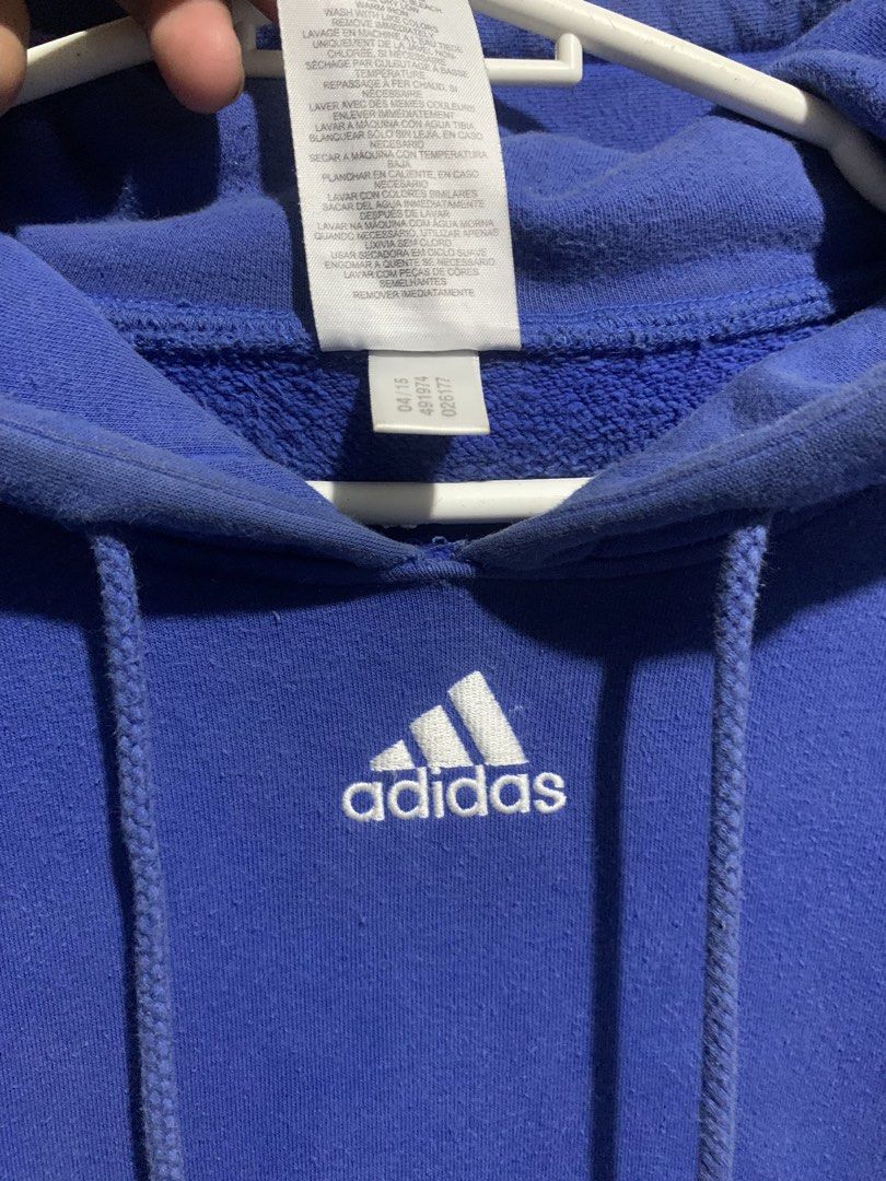 Adidas Blue Hoodie (Category: Coats, Jackets and Outerwear) located in Tarlac. Submitted by durkk4ever (Listing ID 1471258258, Image 3). Description: - Brand/Style: Adidas hoodie in a vibrant bright blue with a classic relaxed fit - Details: Front kangaroo pocket, adjustable drawstring hood, and small embroidered white logo below the neckline - Condition/Quality: Super comfortable for chilly days with solid ribbed cuffs and hem - Origin & Sizing: