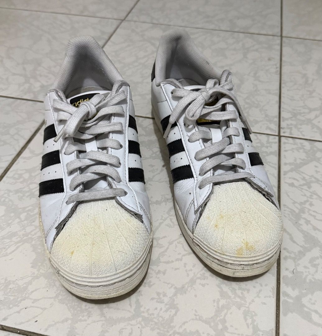 Adidas Superstar White Black Sneakers (Category: Sneakers) located in Manila. Submitted by ytoci (Listing ID 1471253052, Image 2). Description: - Brand: Adidas - Model: Superstar - good condiition but there are signs of yellowing.