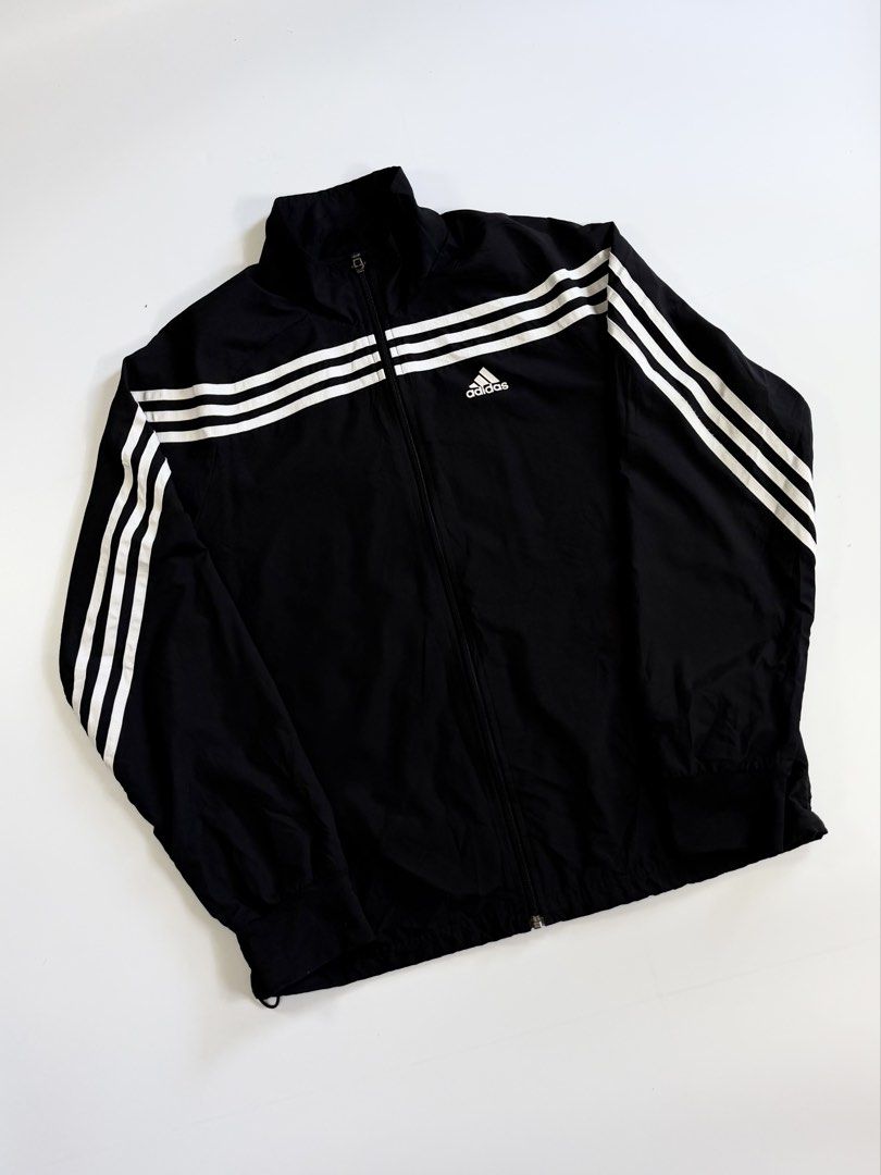 adidas three stripes windbreaker (Category: Activewear) located in Manila. Submitted by styleandfly191238 (Listing ID 1471151014, Image 2). Description: length 28 width 23 issue none conditions excellent color rate 10/10 better in personal fav piece unli vc to check the item to assure your assurance .