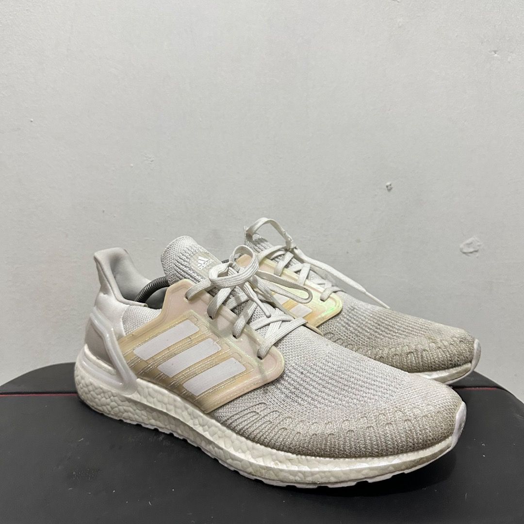 Adidas Ultraboost 20 White Size US 12 (Category: Sneakers) located in Manila. Submitted by johnpm (Listing ID 1471241768, Image 1). Description: - Brand/Model: Adidas Ultraboost 20 - Color: White - Size: US 12 (UK 11.5) - Material & Tech: Knit upper with responsive Boost midsole cushioning - Closure: Lace-up - Condition: Pre-owned with visible dirt and wear on the fabric and soles.