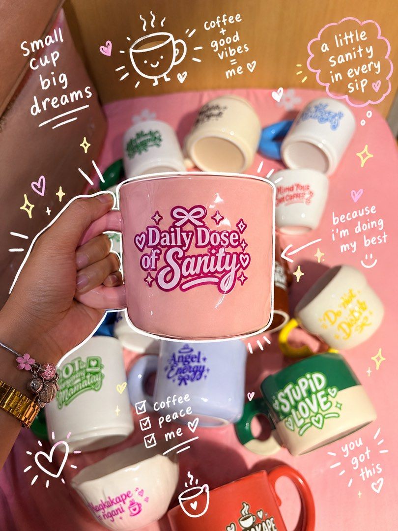 Aesthetic Cute Slogan Ceramic Coffee Mugs (Category: Coffee & Tea Tableware) located in Manila. Submitted by kniccknacks (Listing ID 1471182602, Image 1). Description: - Aesthetic ceramic mugs with fun, trendy quotes - Chunky handle design, perfect for morning coffee and desk setups - Available colors and quotes: * Pink: Daily Dose of Sanity * Purple: Angel Energy * Green: Stupid Love * Off-White: Various quirky texts - Price is per piece (choose