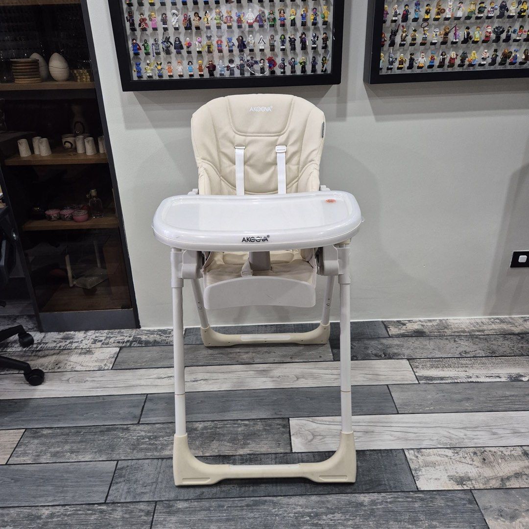 Akeeva Cozzi Baby High Chair Foldable Beige (Category: Baby High Chairs) located in Quezon City. Submitted by ilooverain (Listing ID 1471146477, Image 2). Description: ALL WORKING WELL JUST NEEDS CLEANING. Bought for P7200 selling for 3500 Akeeva Cozzi baby high chair in beige and white. Adjustable height and recline settings. Removable dining tray attaches to the back legs when folded. Padded seat cushion with safety harness straps. Compact fold