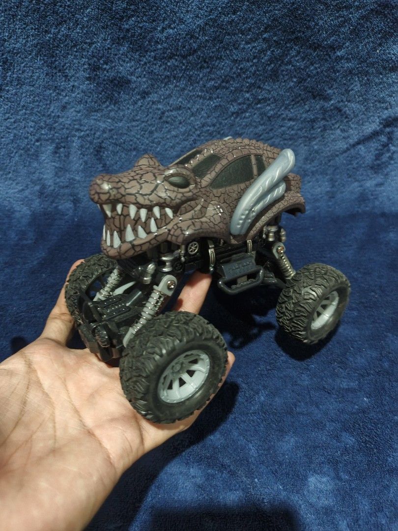 Alligator Monster Truck Toy (Category: Vehicle & Diecast Models) located in Manila. Submitted by kirstentoyshub (Listing ID 1471251985, Image 1). Description: - Alligator Monster Truck: Awesome design featuring a brown scaly body and fierce open jaws with sharp teeth. - Built for Rough Play: Equipped with large knobby rubber tires and a detailed mechanical chassis. - Working Suspension: Features functional suspension springs on all four wheels fo