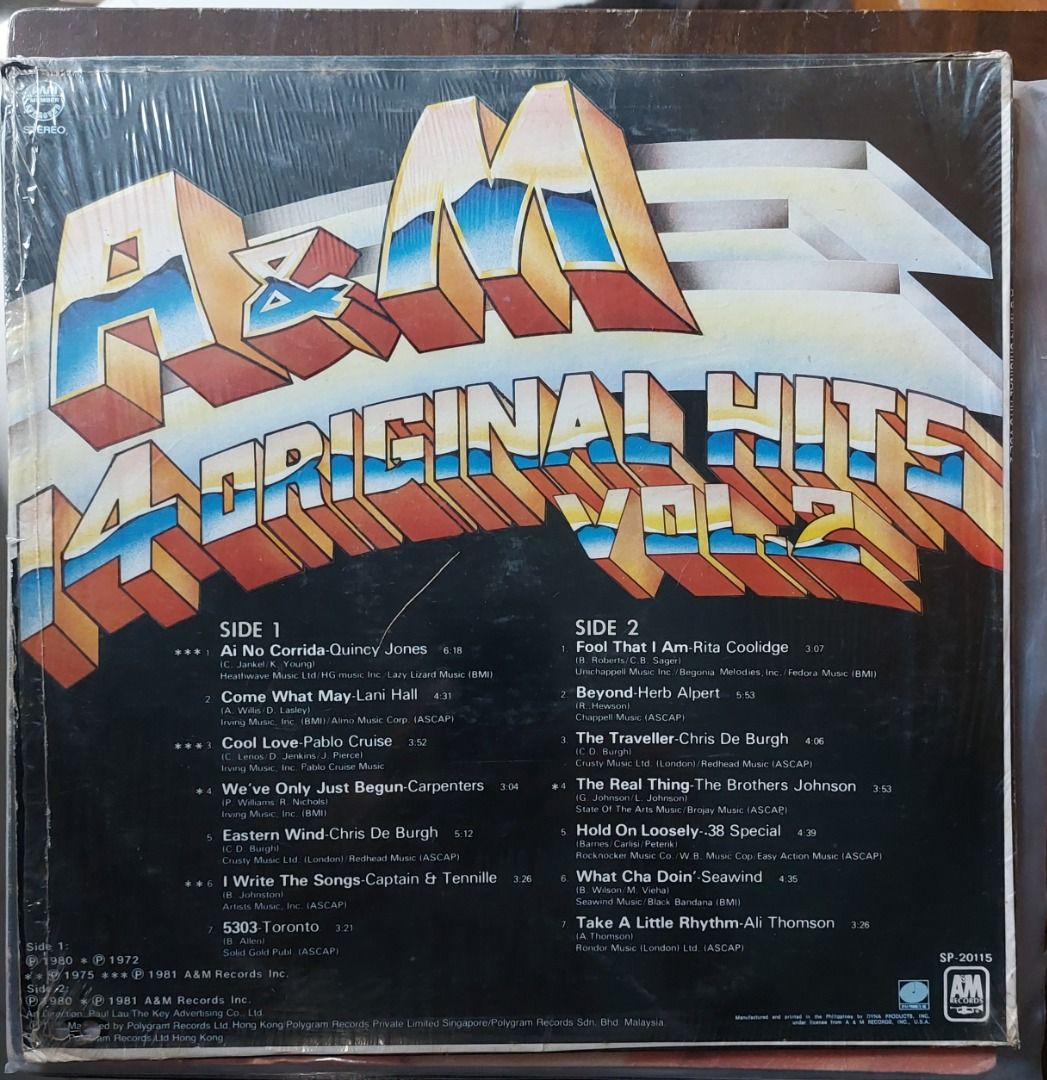A&M 14 Original Hits Vol. 2 Vinyl LP (Category: Vinyls) located in Quezon City. Submitted by safefish_95f205 (Listing ID 1471296528, Image 2). Description: - Compilation album from A&M Records (Catalog # SP-20115) - Features tracks by legendary artists like Quincy Jones, The Carpenters, Chris De Burgh, and Herb Alpert - Includes original inner sleeve and vinyl record - Outer jacket comes with plastic shrink wrap still intact.