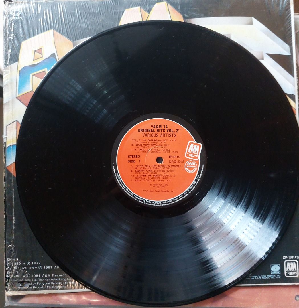 A&M 14 Original Hits Vol. 2 Vinyl LP (Category: Vinyls) located in Quezon City. Submitted by safefish_95f205 (Listing ID 1471296528, Image 3). Description: - Compilation album from A&M Records (Catalog # SP-20115) - Features tracks by legendary artists like Quincy Jones, The Carpenters, Chris De Burgh, and Herb Alpert - Includes original inner sleeve and vinyl record - Outer jacket comes with plastic shrink wrap still intact.